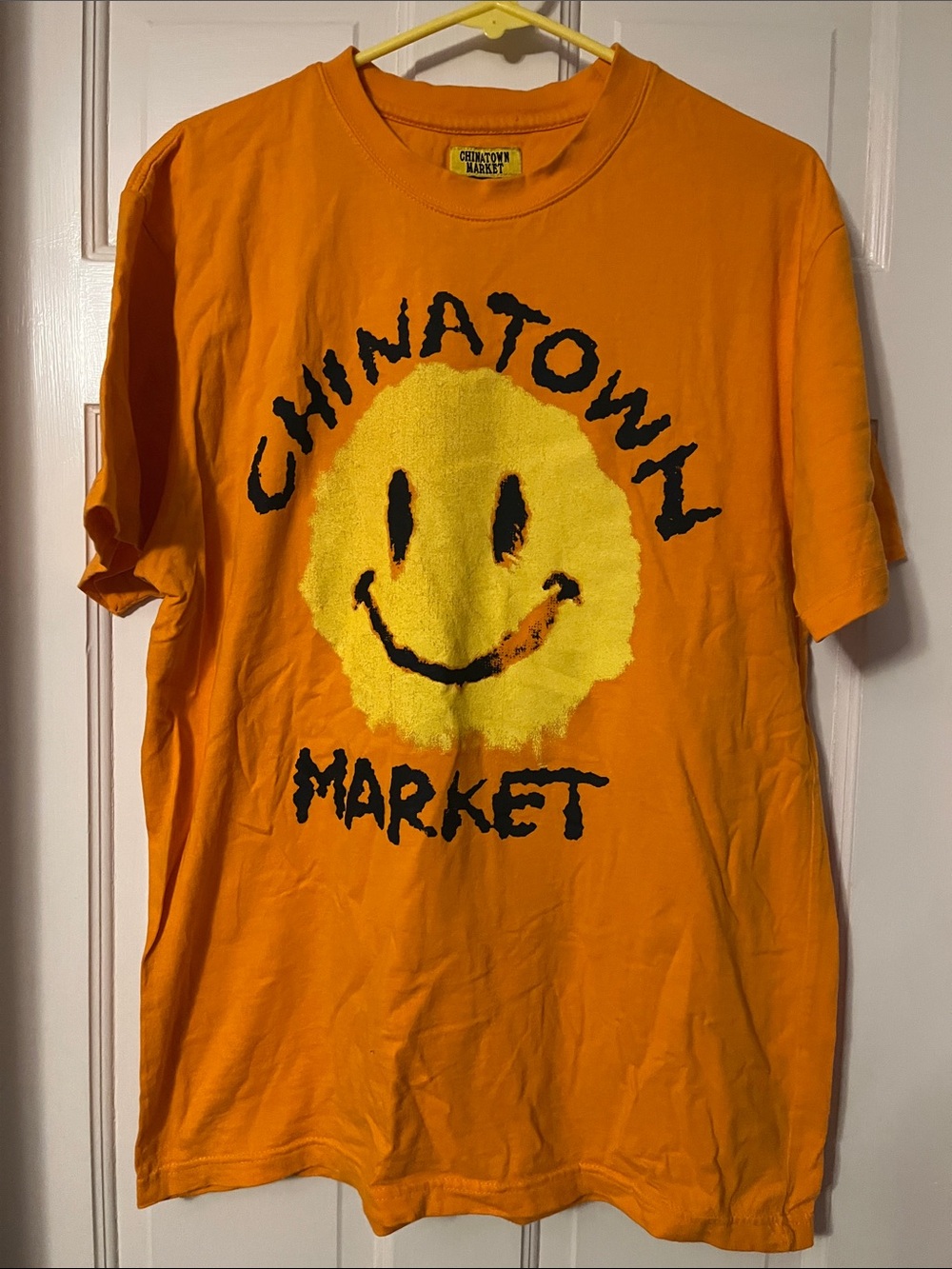 Chinatown Market Men's Orange Smiley Graphic Tee